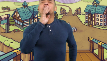 Justin is acting out a hearing person who’s speaking at you from a distance.